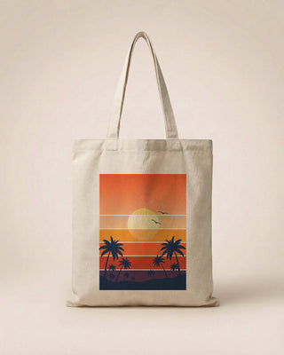 Tote bag with a sunset and palm tree design on a beige background